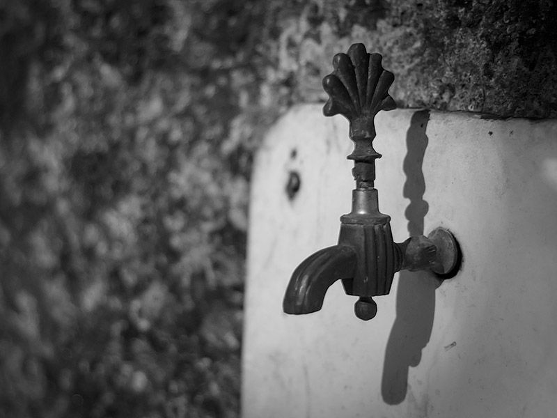 Antiker Wasserhahn